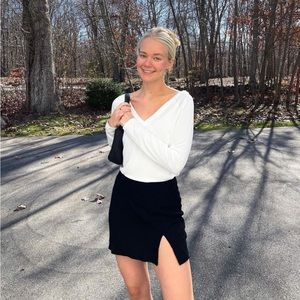 Black mini skirt with slit, size 4, from beginning boutique